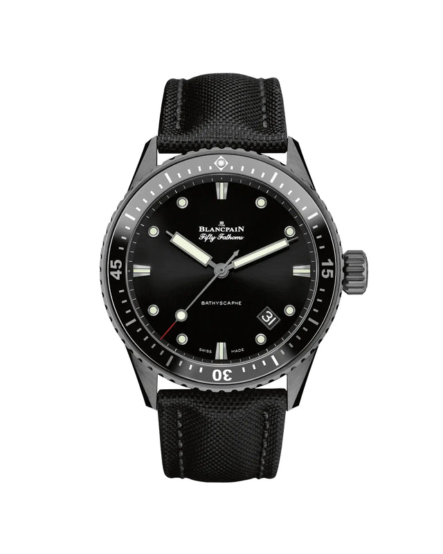 The Blancpain Bathyscaphe is a luxury black ceramic watch featuring a black dial with luminous markers and hands, stainless steel case, black rotating bezel, black fabric strap, and an outstanding 120-hour power reserve.